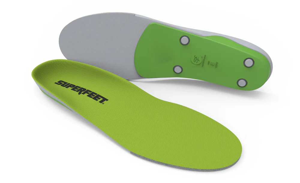 Bright green Superfeet orthotic shoe insoles with gray underside shown from above and bottom.