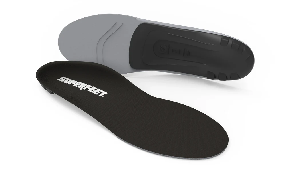 Black Superfeet insole with gray underside, designed to provide arch support and enhanced foot comfort in footwear.