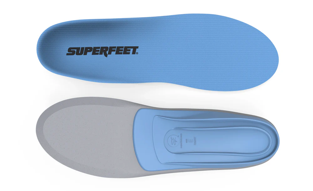 View5_All-Purpose_Support_Medium-Arch_2731x1667_5e1a9992-f9f6-4feb-909e-aa25ef9f115b - Horizon Industries Top view of a blue Superfeet insole with a textured surface and logo, shown above a gray and blue orthopedic insert