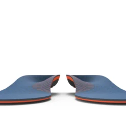 View7_Work_Cushion_2731x1667_13e2809a-f360-4f74-9e88-752959bb2907 - Horizon Industries Pair of blue slip-on shoes facing each other with orange trim along the soles, on a white background.