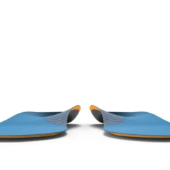 Pair of blue curved shoe insoles with orange undersides, facing each other on a white background.